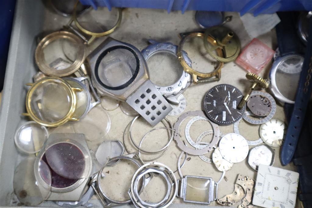 A quantity of mixed clock and watch parts including dials and glasses